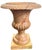 A beautifully sculptural vintage carved marble urn in warm blush-pink tones with dramatic rust, coral, and soft gray...