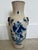 An absolutely gorgeous, hand-painted, blue and white Nanking crackle glaze vase with paired bronzed fu dog handles to ward...