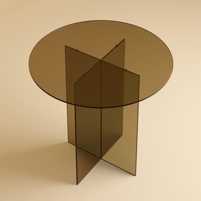 Assembled from Italian glass alone, the Iki is a table scaled for a room and its company that occupies a room without...