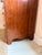 A vintage Henredon bow front chest of drawers, crafted in the United States during the mid-20th century. Known for...