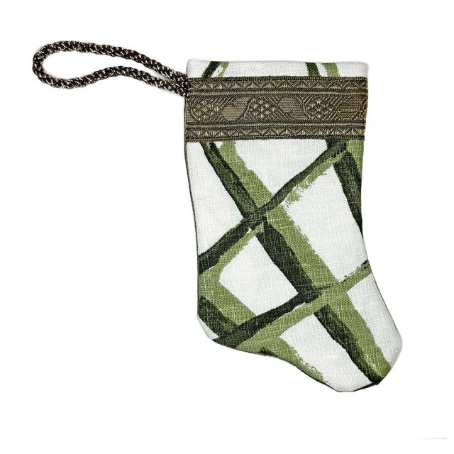 Mini stocking ornaments are made by hand in Louisiana using Palm Orleans fabric and vintage and antique trims from B. Viz....