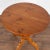 This pine side table is charming with it's softly rounded edges, turned pedestal base and decoratively carved tripod legs...