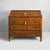 Inlaid wood drop-leaf chest of drawers. The drop-leaf features four drawers with round brass handles, two shelves and a...