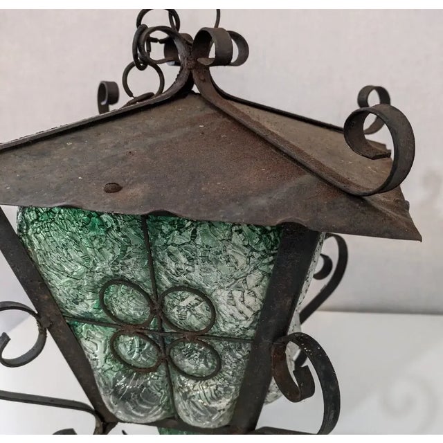 Gothic Spanish Revival Hanging Lantern MCM Wrought Iron Green Crackle Glass VTG Condition: Good condition, rust and wear...