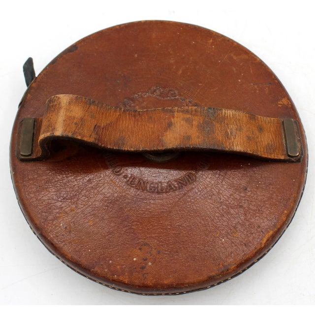 Late 19th century lawn tape by Chesterman, Sheffield, England. Chesterman's patented steel tape in leather case. 200 ft...