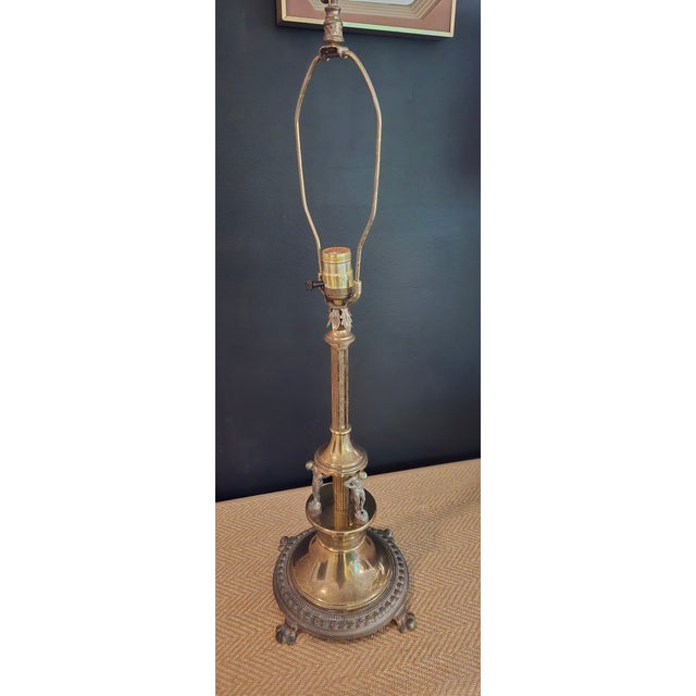 I inherited this beautiful Stiffel style Neo Classical Hollywood Regency Brass table lamp with three Atlas men "holding"...