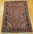 "This traditional Persian Heriz Karajeh rug from Northwest Persia features the iconic three-medallion layout...