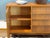 Stylish small chest of drawers from the 1960s. Walnut veneer. Very high-quality workmanship and unusually heavy for its...