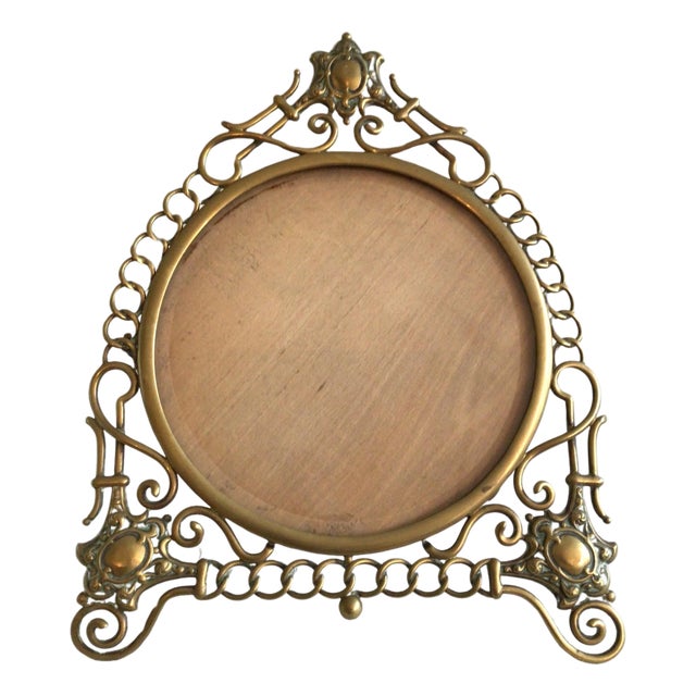 1900's English Scrolled Brass Circular Picture Frame With Medallion Accents For Sale
