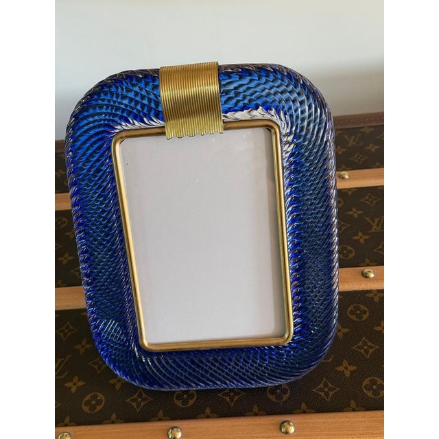 This magnificent vertical photo frame is purely in the tradition of Venetian glassmaking. The technique used to achieve...