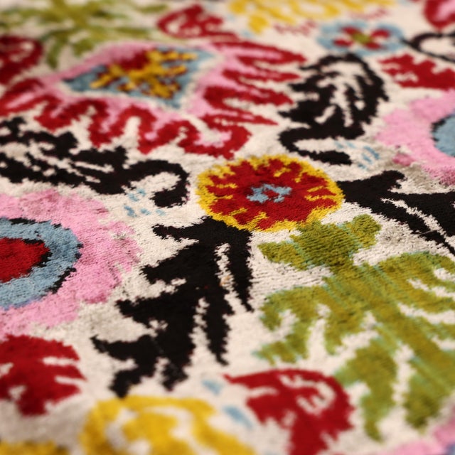 "Evoke the mystery of a desert night with this masterfully hand-knotted silk velvet ikat pillow. Measuring 16x16 inches...