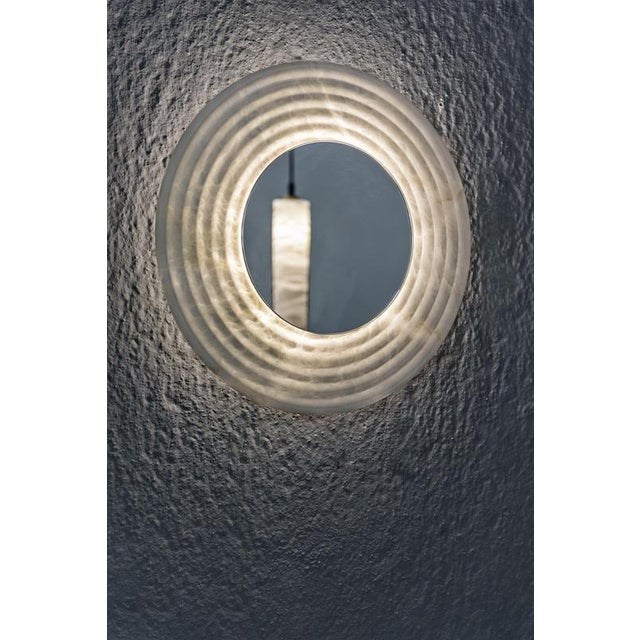 Mirror disc xl wall lamp by united alabaster dimensions: ⌀ 80 x h 5,5 cm (customizable height) materials: alabaster,...