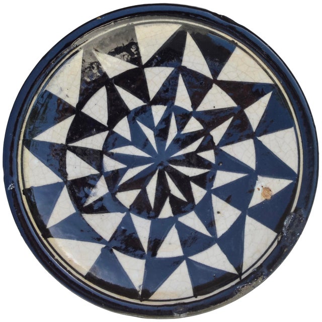 Spectacular antique Moroccan ceramic decorative plate exceptionally handcrafted and glazed. Featuring an elaborate hand-...