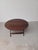 Danish circular Handcrafted foldable mahogany coffee table, 1960s. The rare well designed and very well crafted foldable...
