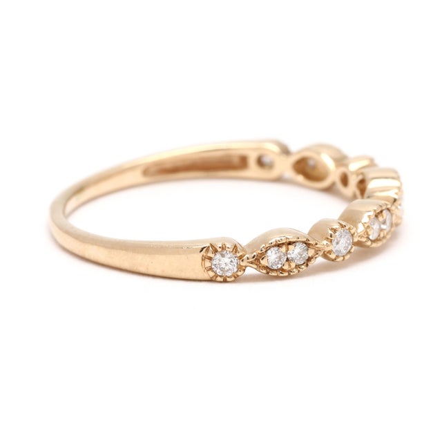 Stones: diamond round brilliant cut 1.2 - 1.75 mm approximately .18 total carats GH color/ SI2-I1 clarity Ring Size: 7.75...