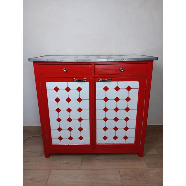 A striking piece of antique furniture. It was once used for storage and later graced a butcher shop and then a restaurant....