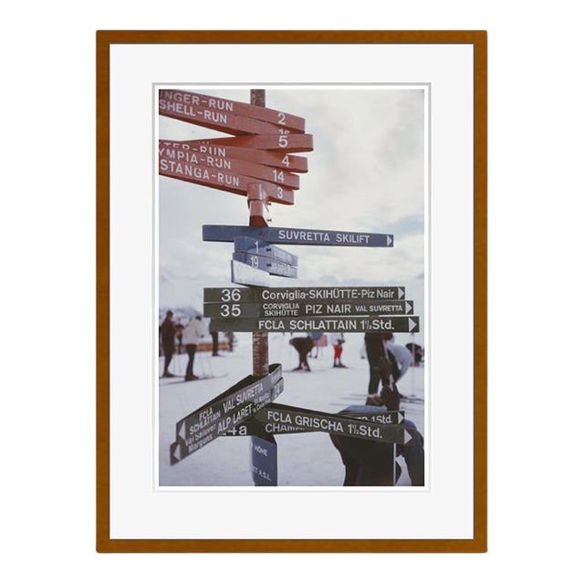 Signpost in St Moritz 1963 by Slim Aarons Framed C Print For Sale
