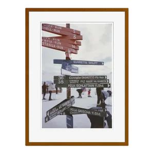 Signpost in St Moritz 1963 by Slim Aarons Framed C Print