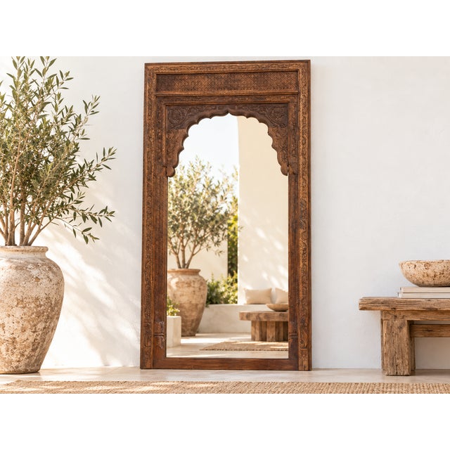 This is architectural grandeur at its finest. Standing at a breathtaking 116 inches tall, this monumental floor mirror...