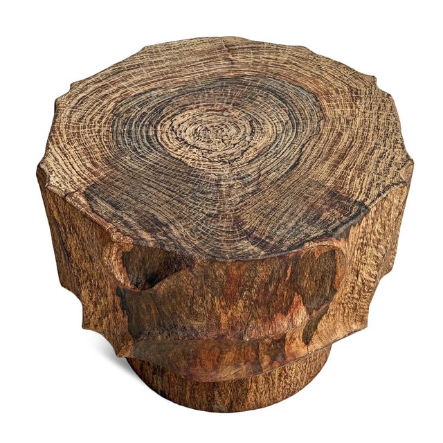 Sculptural side table / stool crafted from a single solid block of richly grained lychee wood. This piece showcases a...