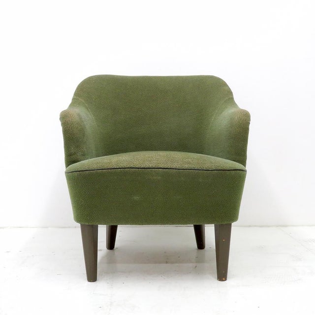Elegant Danish modern club chairs, 1940, original olive upholstered body on a solid beech wood frame with hand tied spring...