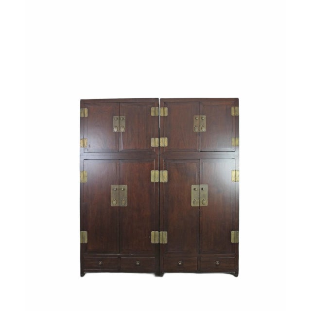 Traditionally this classic Chinese storage cabinet was always used as a pair and placed symmetrically in a living room to...