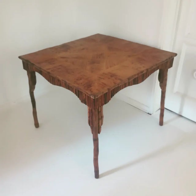 This beautiful table is from the 1910s - 1920's. It is all hand build with bamboo wood and it has an amazing old surface.