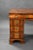 For sale is a good quality antique figured walnut desk, having a shaped, hand coloured leather hide writing surface, above...