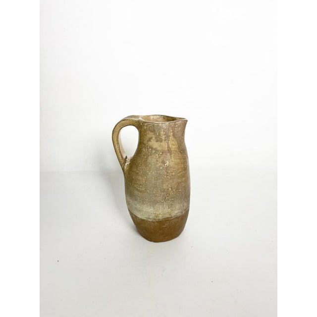 Stoneware pitcher, France, 1960s. An authentic French stoneware pitcher with clean, organic lines, characteristic of 1960s...