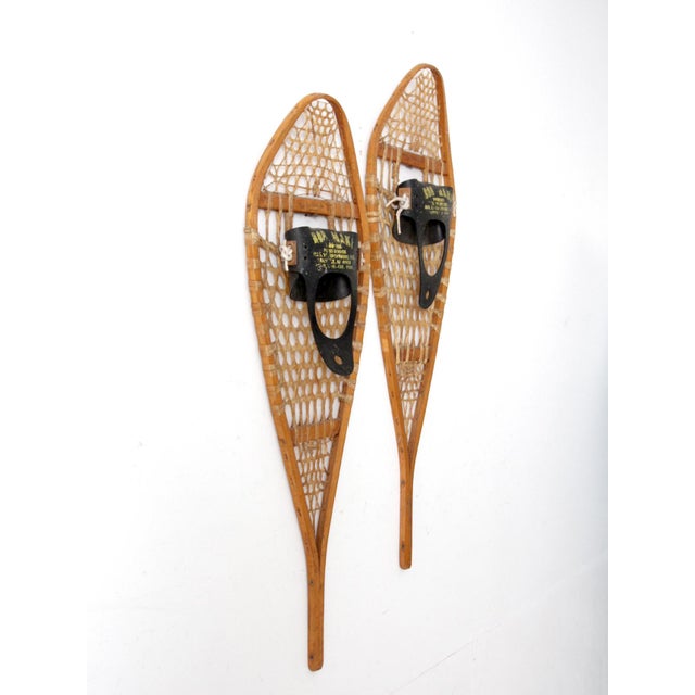 This vintage pair of Canadian snowshoes adds authentic lodge-style character to rustic, alpine, and mountain-inspired...