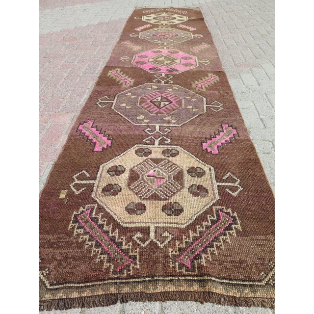 This beautiful runner rug is from easthern of Turkey Kars. About 60 years old. It is handmade with pure wool. Made with...