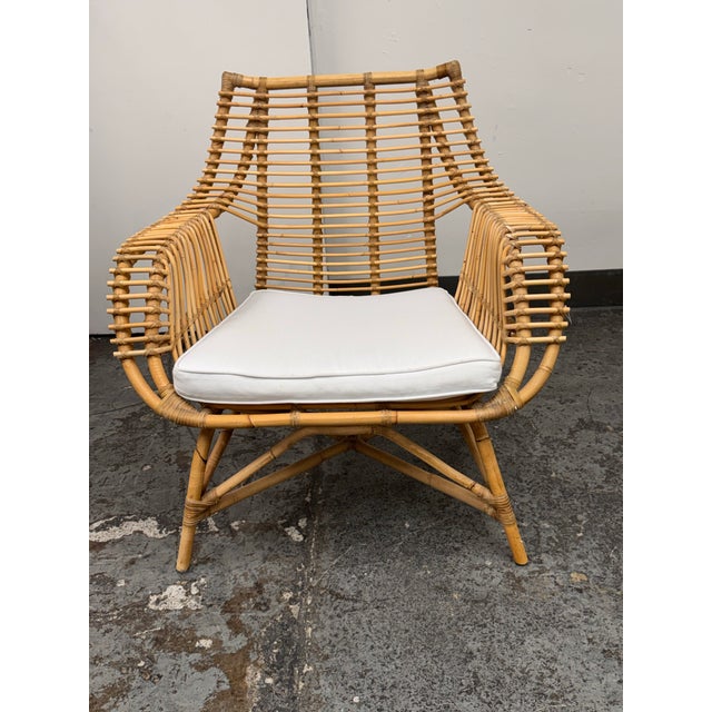 Design Plus Gallery presents the Venice Rattan Armchair from Serena & Lily. The chair has a steamed and hand-bent rattan...