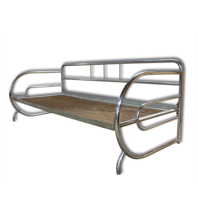 Original chromed Bauhaus sofa from 1930s Bohemia, attributed to the renowned manufacturer Hynek Gottwald. It presents a...