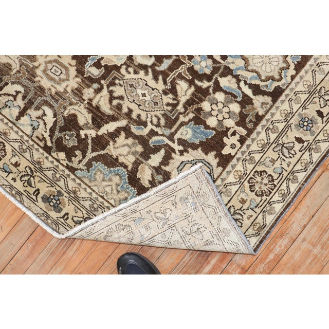 An antique Persian Malayer Rug from 2nd quarter of the 20th century with a chocolate brown ground Rug no. j2550 Size 5'6"...
