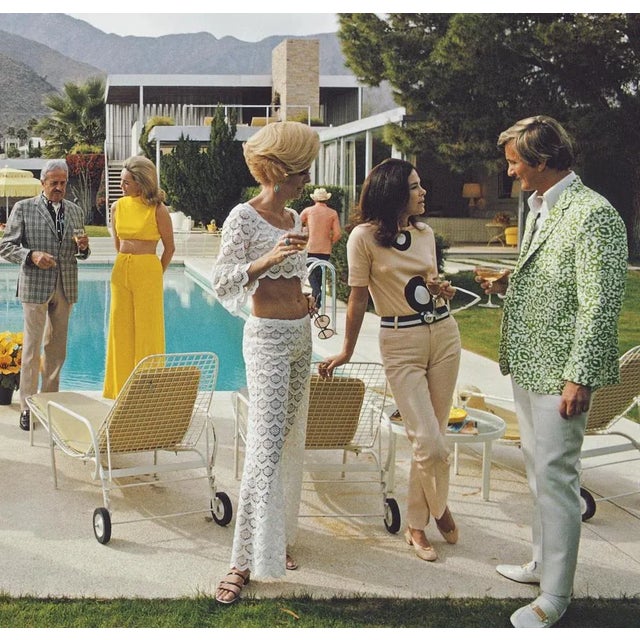 Slim aarons estate limited edition c print 40 x 30 inches / 101 x 76 cm unframed. ' poolside party ' a poolside party at a...