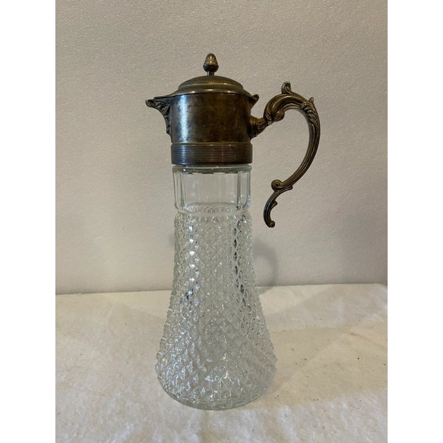 Silverplated Diamond point wine claret ewer with handle and hinged lid.