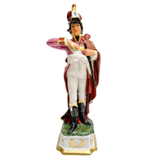 Set of three vintage Italian porcelain figurines depicting Napoleonic-era soldiers. Standing 12 inches tall, each figure...