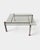 Original Italian coffee table from the 1980s, featuring a bold geometric construction characteristic of the Postmodern...