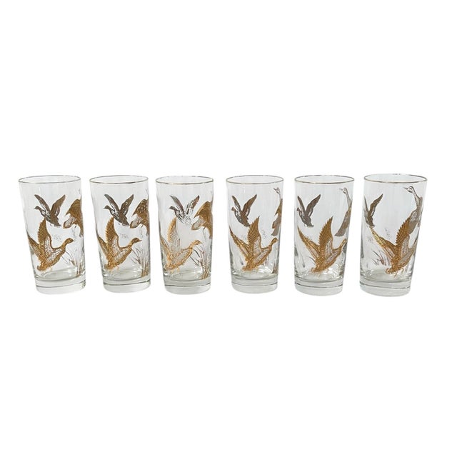The Vintage Libbey Golden Mallards by Libbey Highball Glasses are a set of 6 round, 5.5" drinking glasses with a medium...