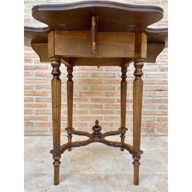 Old English Georgian style card table or game table. Antique wing side table with green baize. The table is foldable, its...