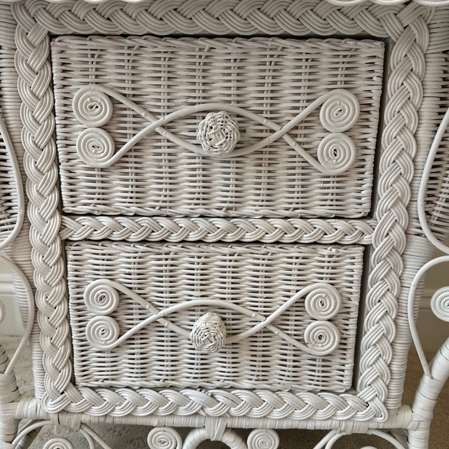 This exquisite fiddlehead wicker piece will add elegance to your bedroom or wherever it might fit into your home! With two...