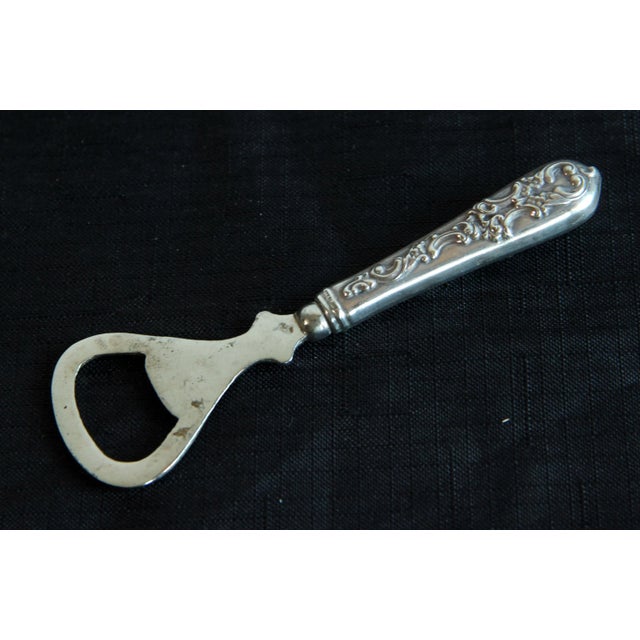 Beautiful vintage sterling silver handheld bottle opener! Measures 5" in total length and is in very good condition as...