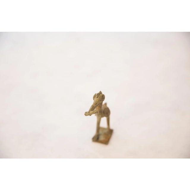 :: Vintage handmade oxidized bronze crowned stork with fish. Circa mid 20th century and possibly older, this piece has...