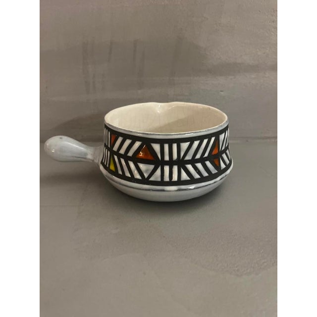 A very rare crackle-glazed frying pan by the renowned ceramicist Roger Capron in Vallauris, dating from the 1970s. Signed...