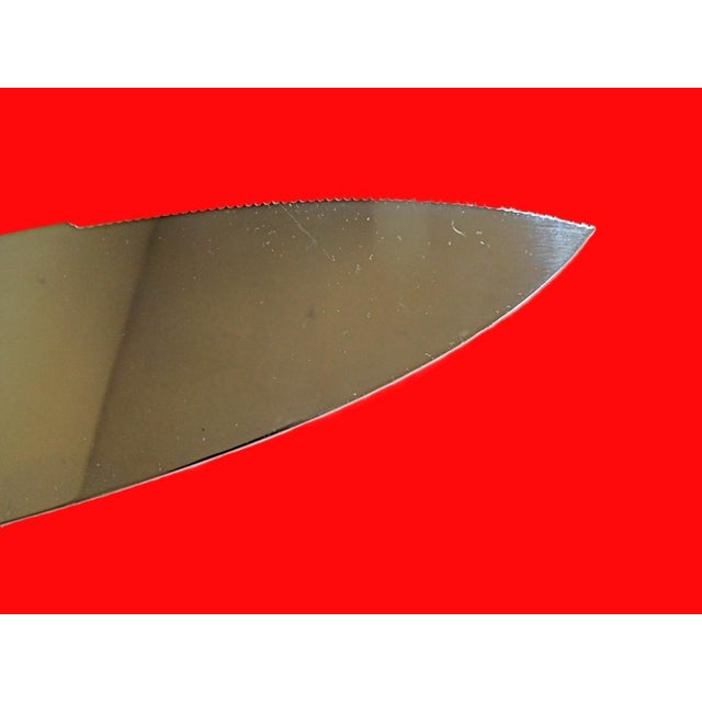 Midcentury International 'Silver Rhythm' sterling silver pie or cake server. This has a sterling handle and a stainless...