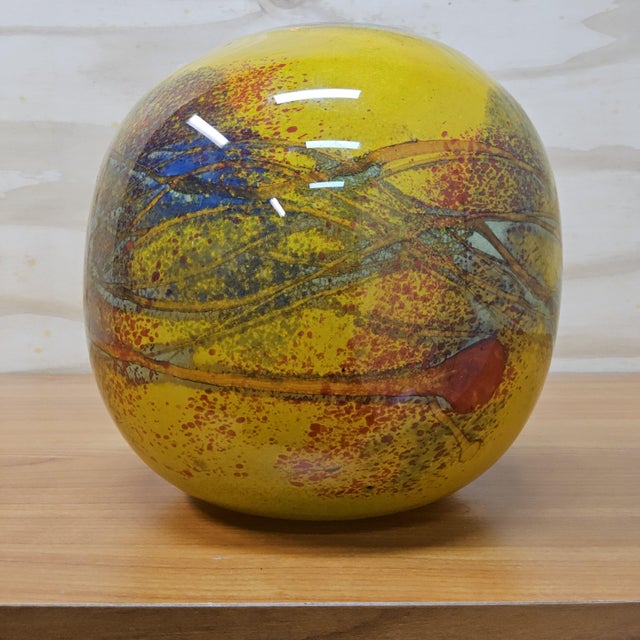 DESCRIPTION: Exceptional handmade studio glass object / vase of heavy quality, executed in a striking yellow color with...
