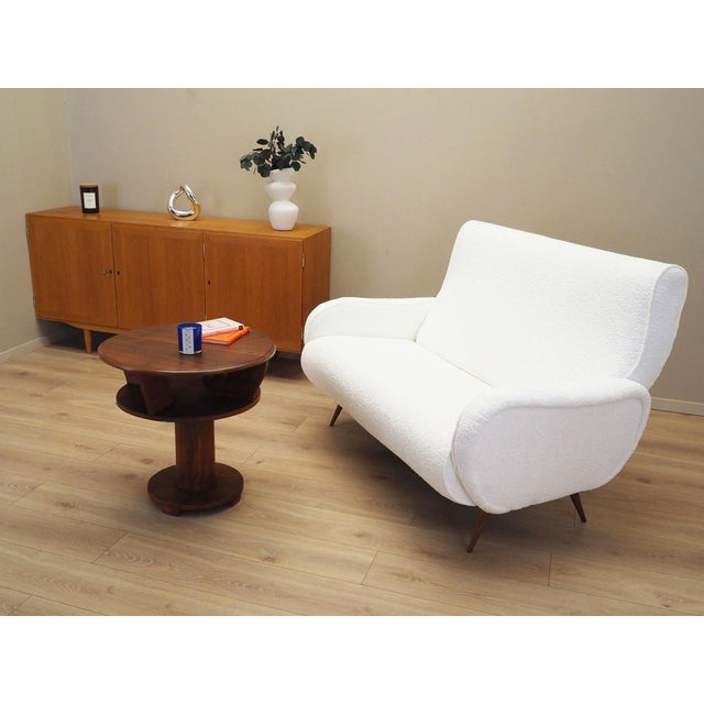 The sideboard was made in the 1970s, produced by the Danish manufactory Hundevad & Co. It was designed by the well-known...