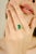 This luxurious emerald cocktail ring features an emerald-cut natural emerald weighing 2.78 carats, beautifully accented by...