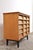 Chest of drawers with 15 drawers. Late 1930s / early 1940s. Originating from a school. The drawers feature slanted oak...