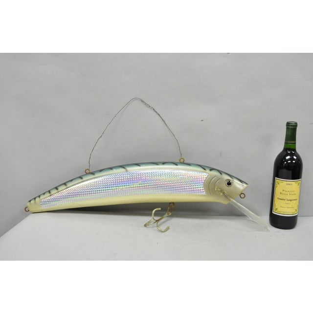 Vintage Wooden Giant Rapala 28” Fishing Lure Hanging Display with Rainbow Decal. Circa Late 20th Century. Measurements:...